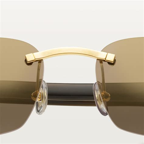 sunglasses with elongated c de cartier motif